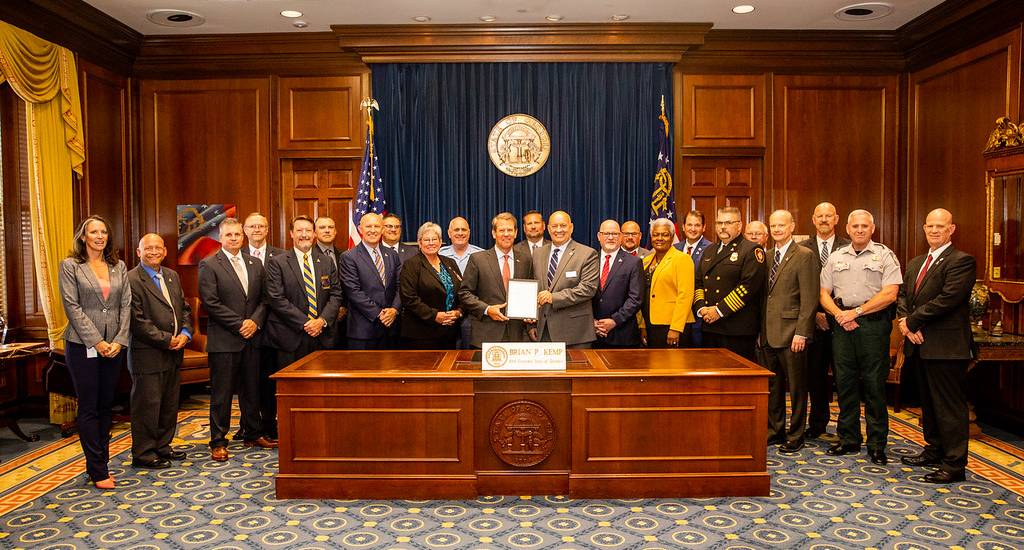 Group photo of Command College and Brian Kemp