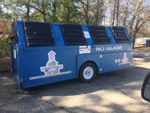 a blue recycling trailer