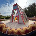 Sculpture of stained glass in the shape of a 3 dimensional triangle