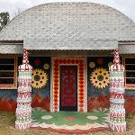 Pasaquan entrance flanked by colorful painted totems