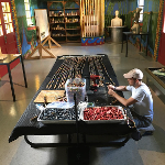 Beaded curtain at Pasaquan being repaired during restoration