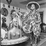 Eddie Owens Martin standing at Pasaquan