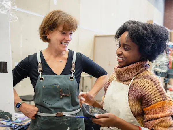 professor talking with a student