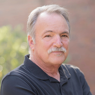 a headshot photo of Joe Sanders