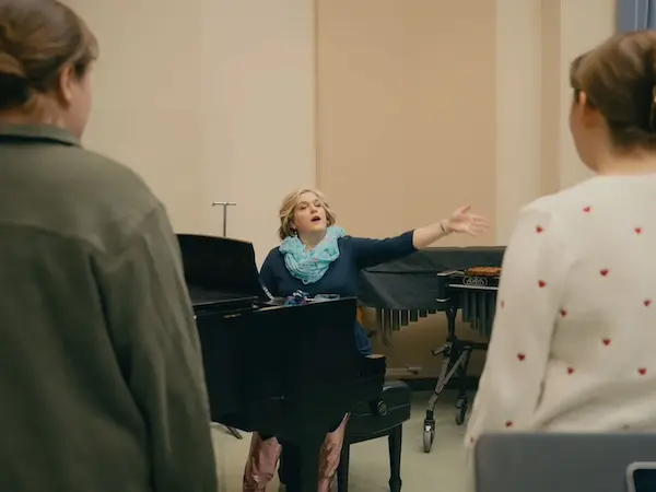 music professor teaching 2 students