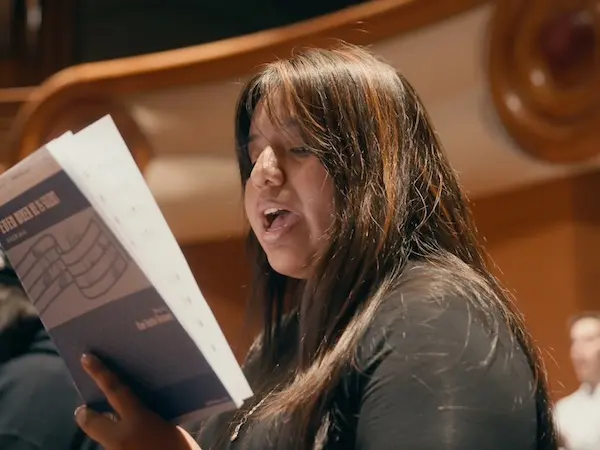 A music student singing