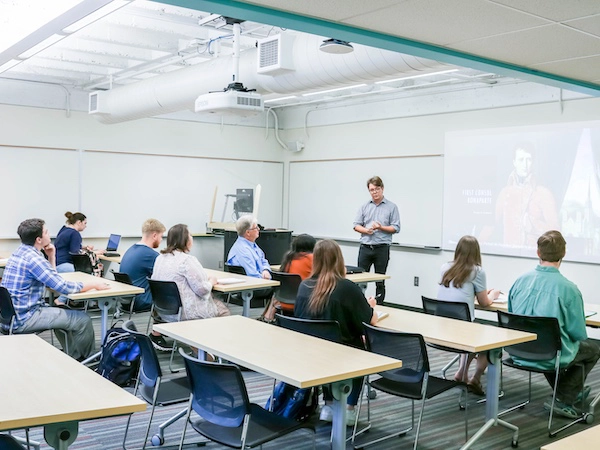 Professor speaking to a classroom of students