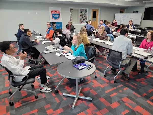 Business students doing mock interviews