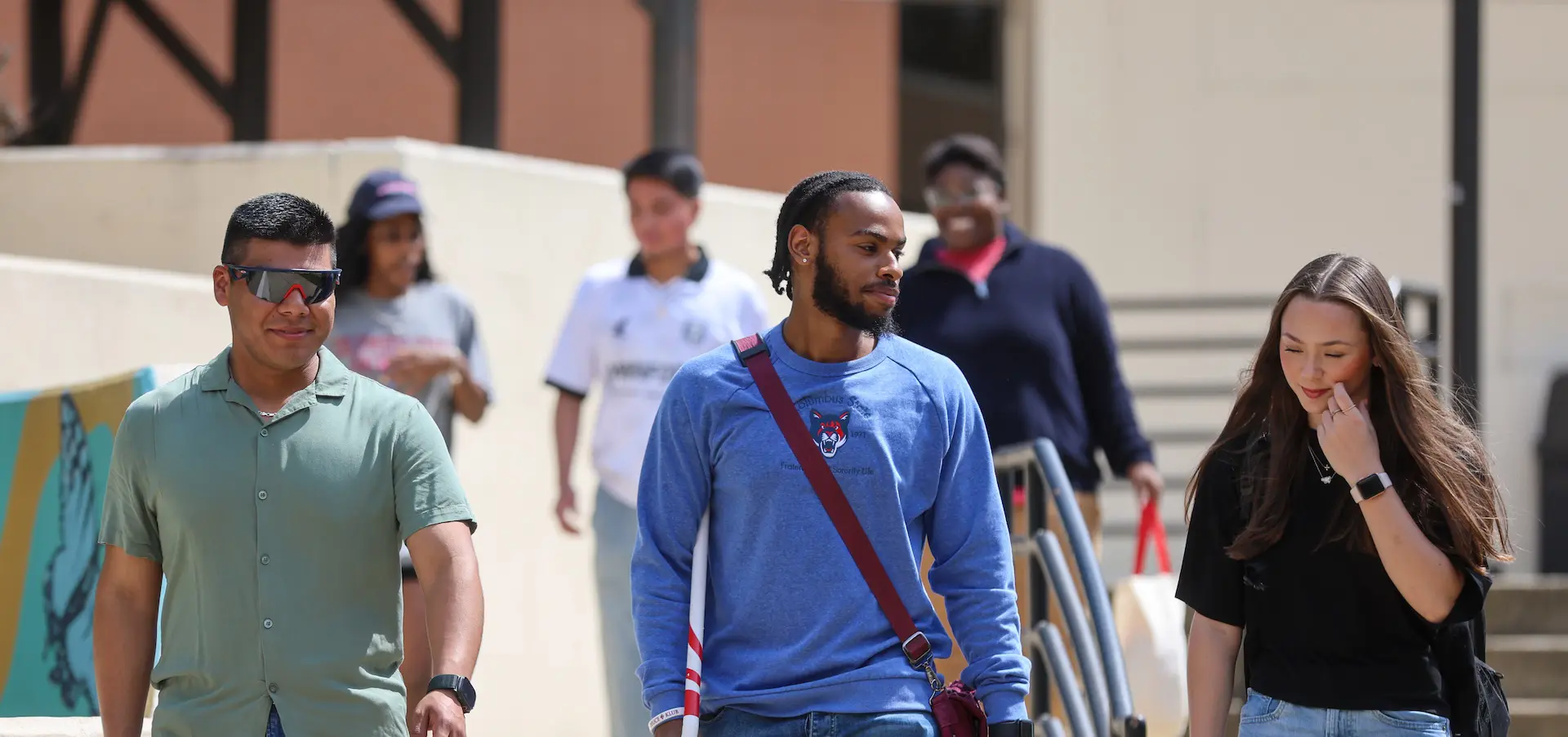 several students walking on main campus