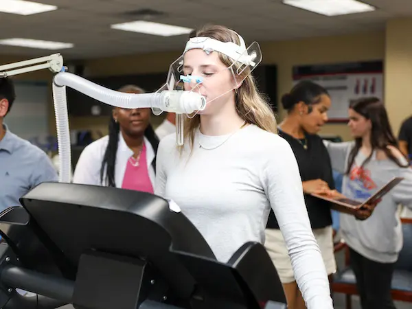 students working with fitness testing equipment