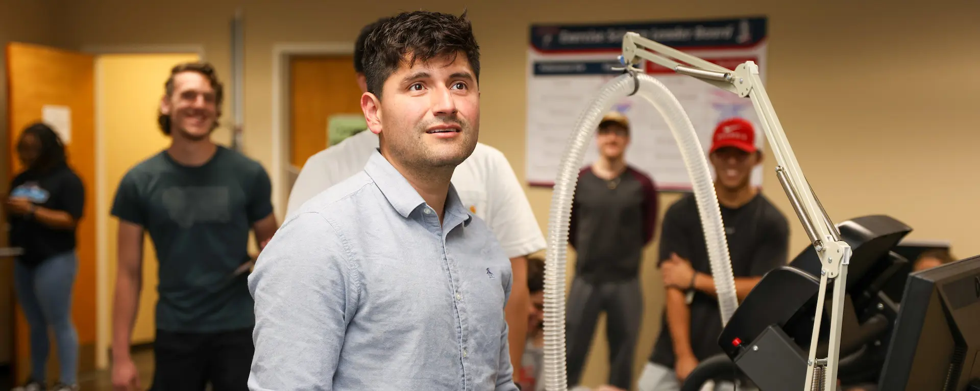 students working with exercise equipment