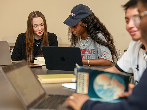 Two students studying together in the CSU library