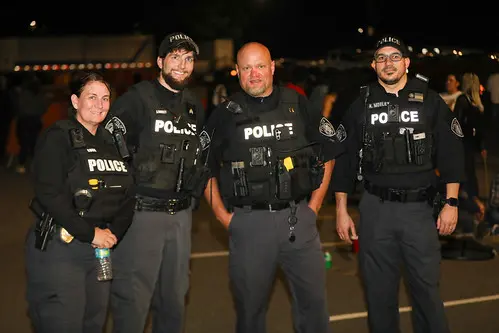 four policeman standing together
