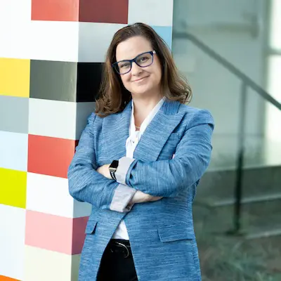 a headshot photo of Leigh McCormick
