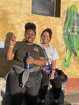 two female students posing for the camera
