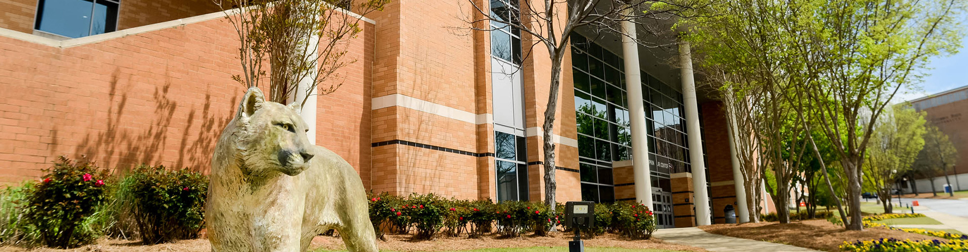 the Cody the Cougar statue in front of the Lumpkin Center building