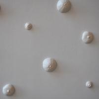 White canvas, bubbles of various sizes 