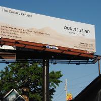 A roadside billboard for a CSU art exhibit 