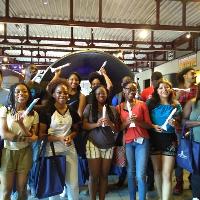 a group o students posing and holding model rockets