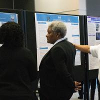 multiple people viewing a presentation display