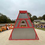 Sculpture of stained glass in the shape of a 3 dimensional triangle