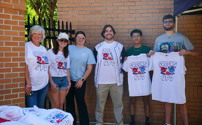 Greek life student hanging out with campus police