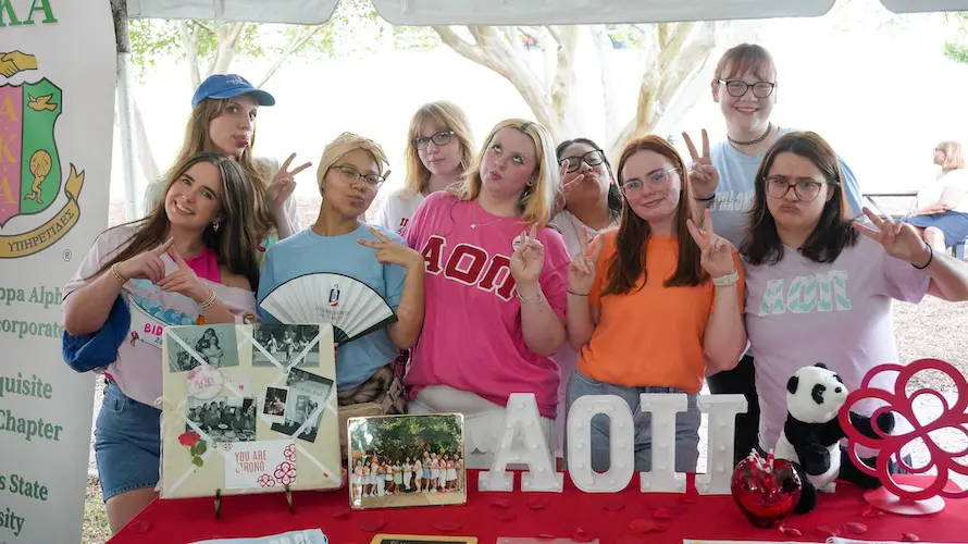 group of sorority girls making funny faces for the camera