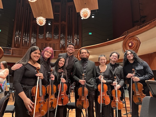 Viola students posing on stage