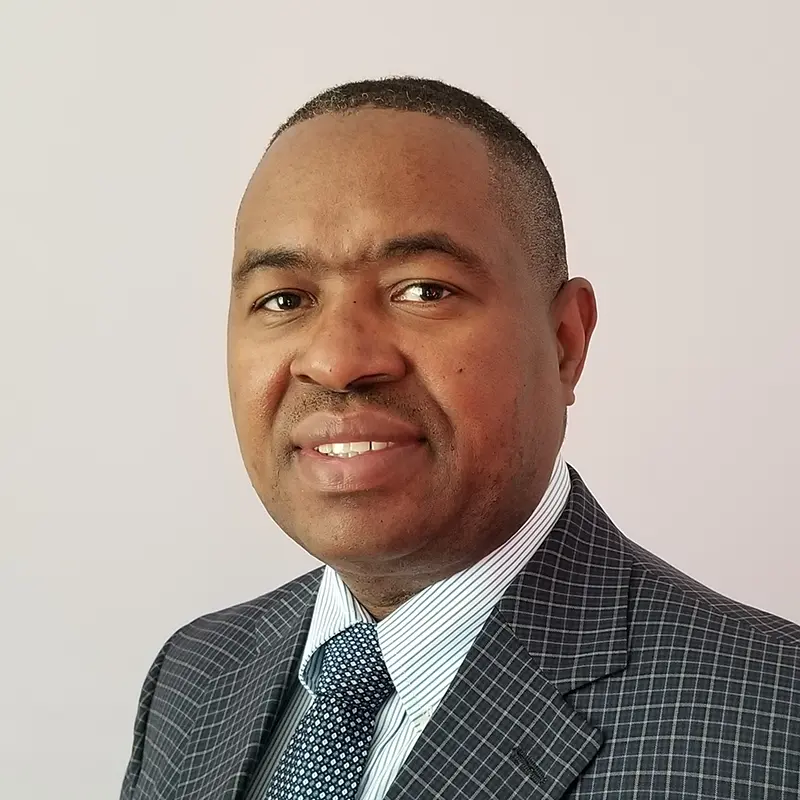 headshot of Ben Kamau