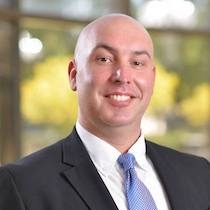 headshot of Joshua May