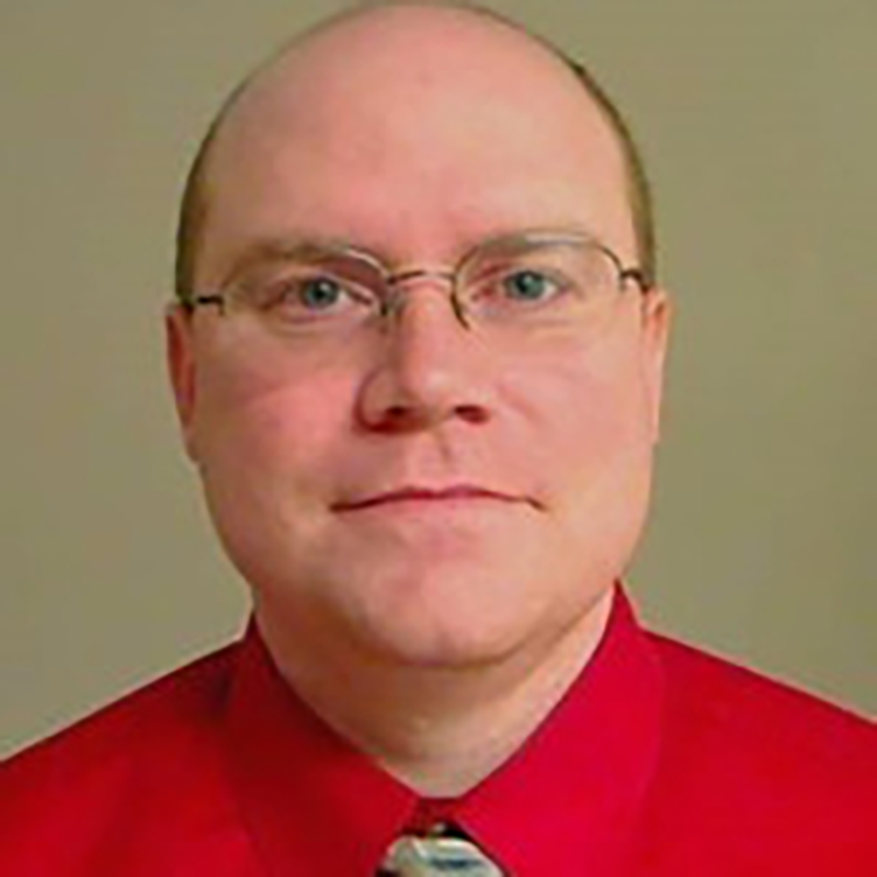 headshot of Julian Rierson, D.B.A.