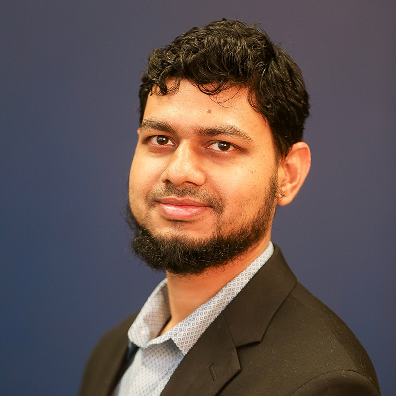 headshot of Dr. Rahmatullah Roche