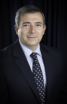 headshot of Dr. Deniz Peker