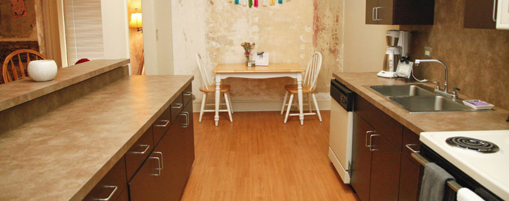 kitchen and dining area with a table and two chairs