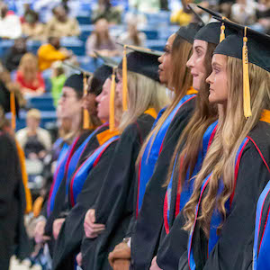 Students standing at graduation