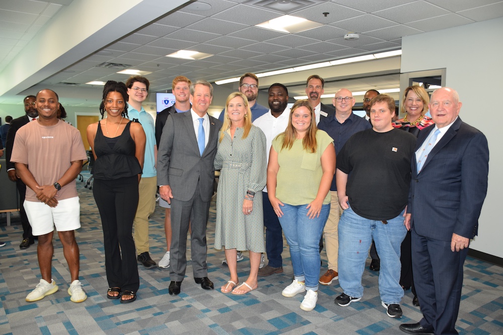Governor Brian Kemp in a photo with students of the Cyber Security program at Columbus State University.