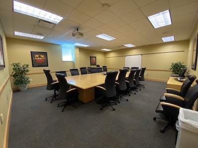 conference room with large central desk