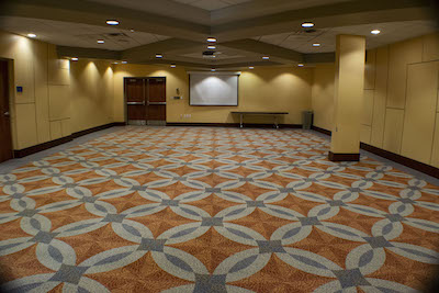 empty carpeted meeting/banquet room