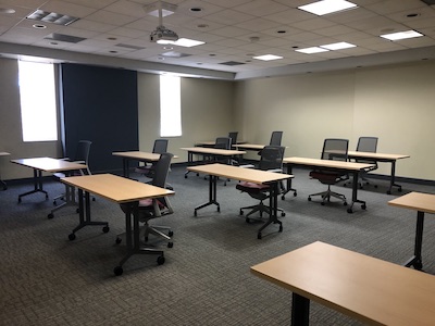 classroom, long desks, chairs